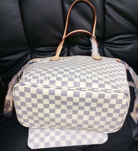 louis vuitton neverfull clutch fake|louis vuitton faux.